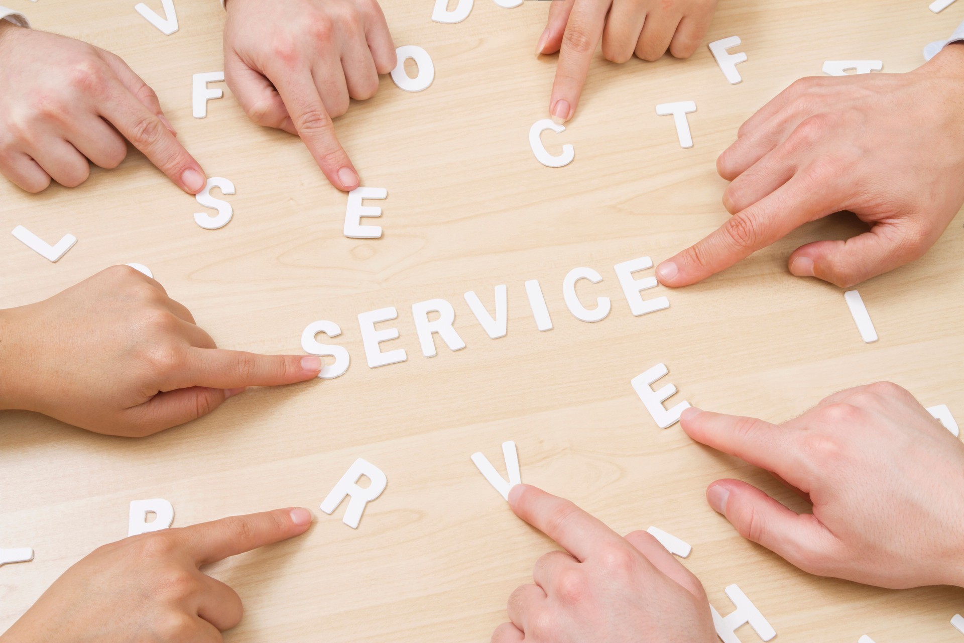 Business People Writing "Service"